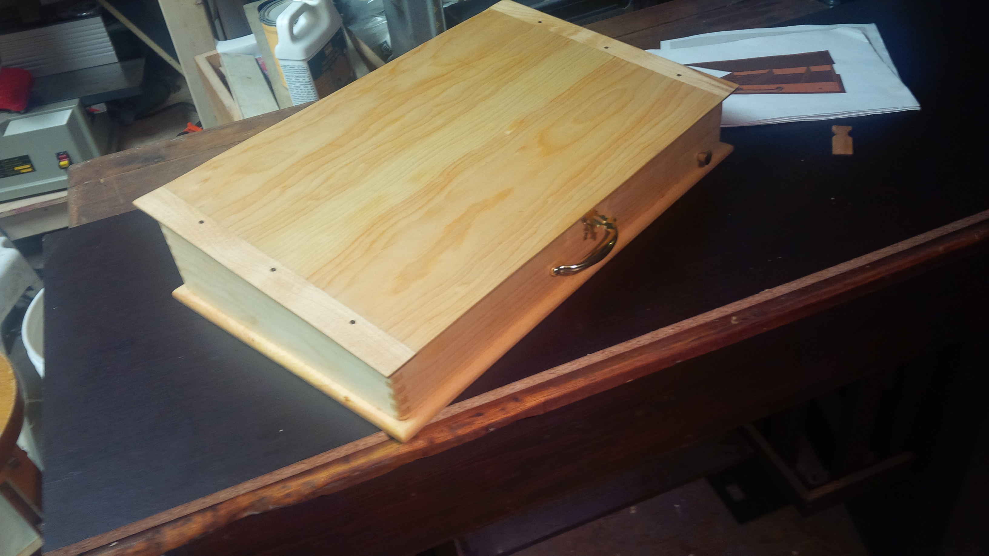 Artist's Laptop Case - this one in pine with maple breadboard ends and padouak dowels. It will also be available in cherry with walnut breadboard ends.