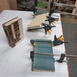 Glue up of the books with printed spines